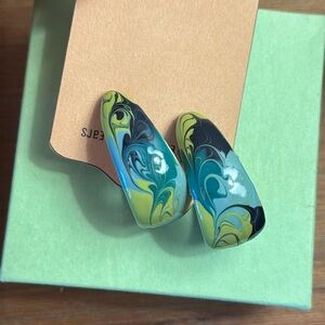 Artisan hand-painted earrings.